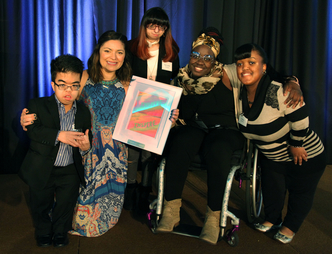 Students present Jenny DiNoia with artwork.
