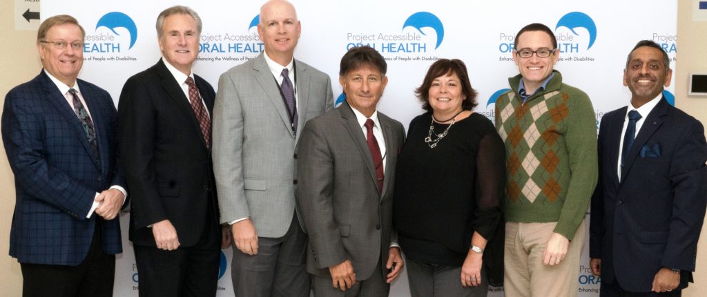 [L-R] Special Care Dentistry Association leadership gather to support Project Accessible Oral Health: Robert Patterson, Dr. Jeffrey L. Hicks, Dr. Stephen Beestra, Dr. David Miller, Dr. Maureen Perry, Dr. Scott Howell and Dr. Dhru Bhatt.