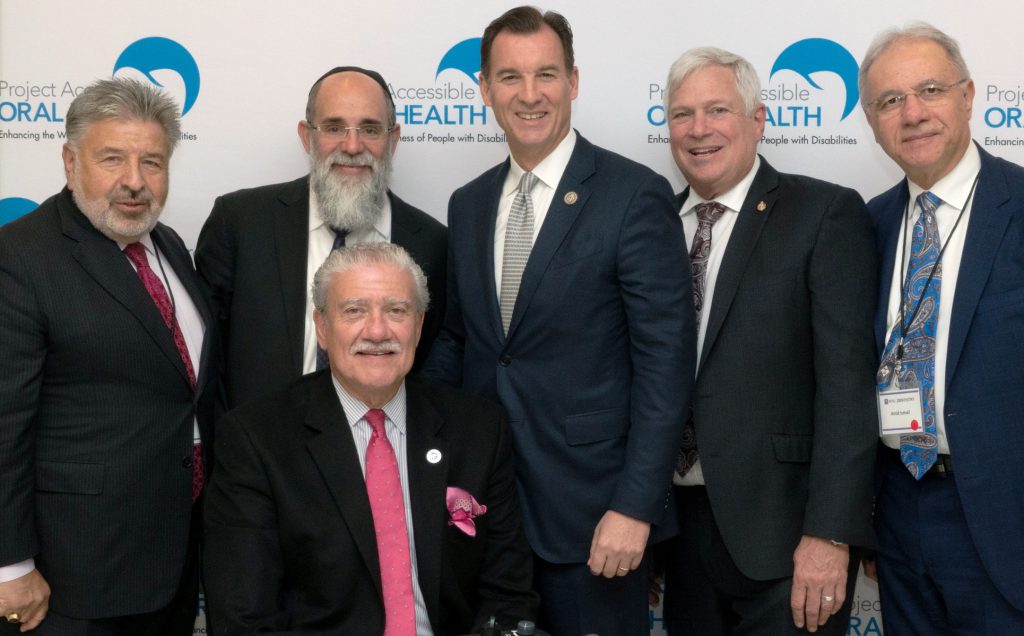Seated, Front  - John D. Kemp, President & CEO, The Viscardi Center; Chairman, Project Accessible Oral Health. Standing, L to R - Steve W. Kess, Vice President Global Relations, Henry Schein, Inc.; Rabbi Kalman Samuels, Keynote Speaker and Founder, Shalva; Tom Suozzi, U.S. Congressman; Mark S. Wolff, DDS, PhD, Morton Amsterdam Dean (Effective 1 July 2018), University of Pennsylvania, School of Dental Medicine; and Dr. Amid Ismail, BDS, MPH, DrPH, MBA, Keynote Speaker and Laura H. Carnell Professor and Dean at the Kornberg School of Dentistry, Temple University.