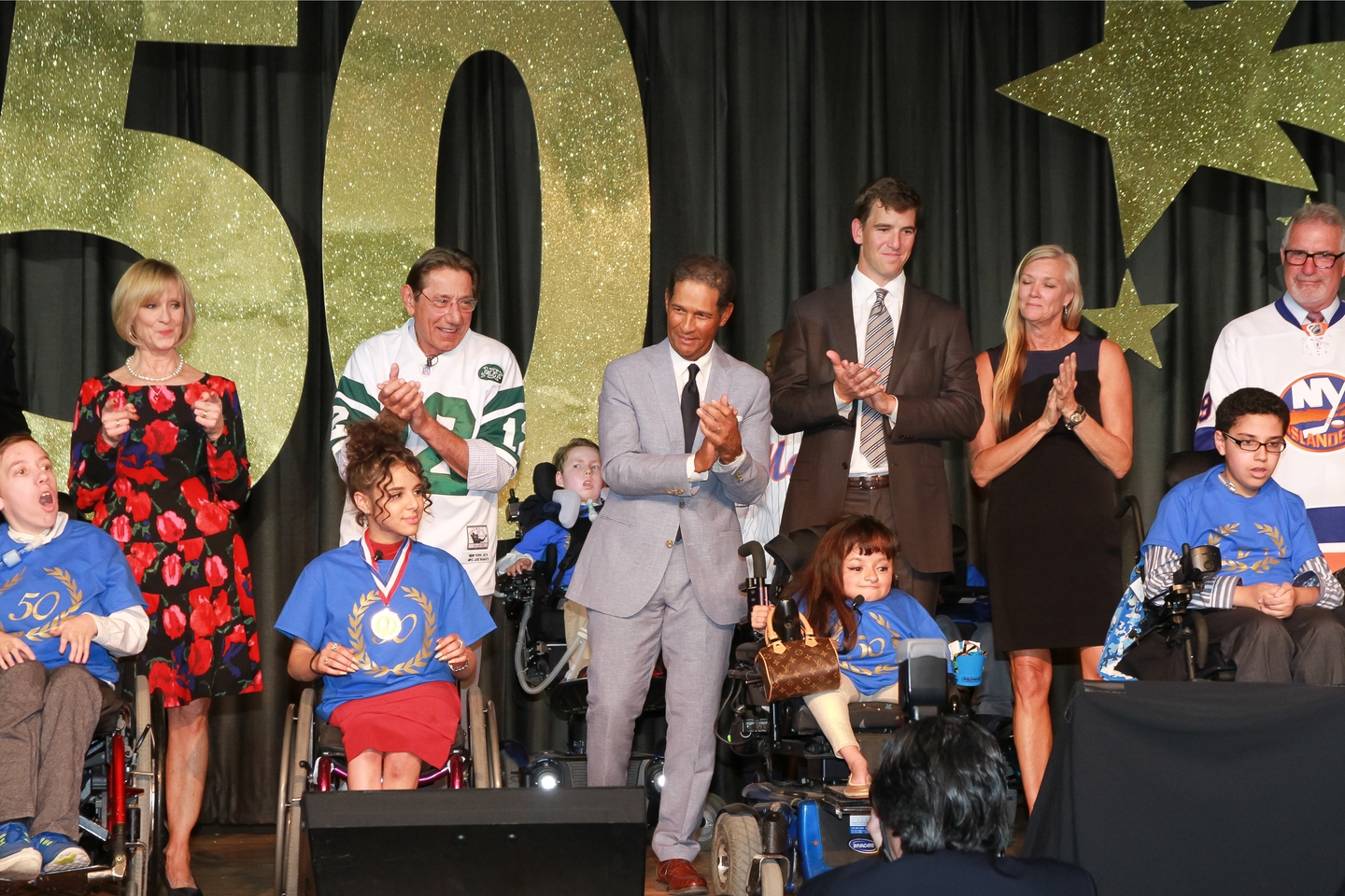 Celebrities, athletes and students on stage for the grand finale of the 50th Annual Celebrity Sports Night.